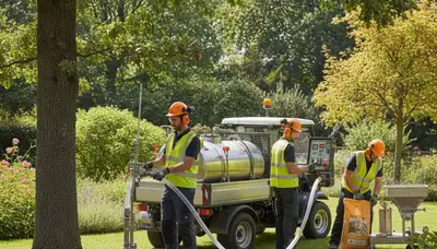 Miami, FL arborists applying tree fertilizer for healthier trees in sandy soil and tropical conditions